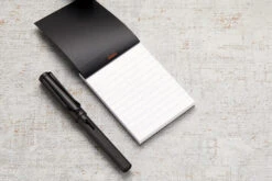 Rhodia No. 11 A7 Notepad - Black, Lined -Writing Tools Store Rhodia ClassicNotepad TopBound A4 No11 Stapled Lined Black 2