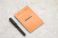 Rhodia No. 13 A6 Notepad - Orange, Graph 11 Rhodia No. 13 A6 Notepad - Orange, Graph -Writing Tools Store Rhodia ClassicNotepad TopBound A4 No13 Stapled Graph Orange 1